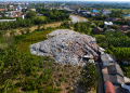 Garbage mound amidst rural landscape Menutup Luka Lama di Sriamur: Saat Pemerintah dan Warga Bergerak Bersama Atasi Sampah Ilegal